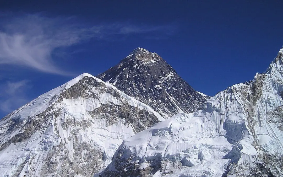 The top of a snow-covered mountain.