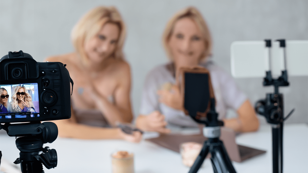 Women in front of cameras