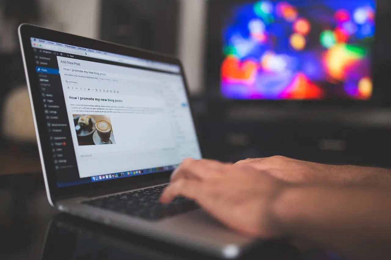 A Person using a notebook computer.