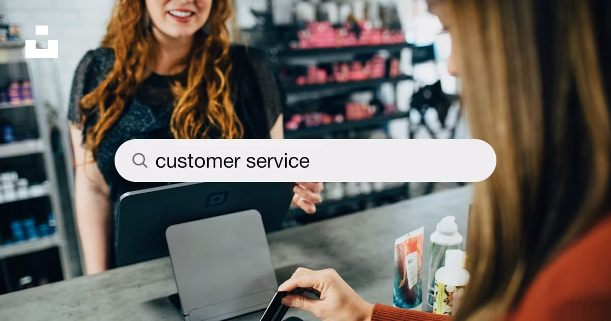 Customer service talking place between a female customer and a female cashier.